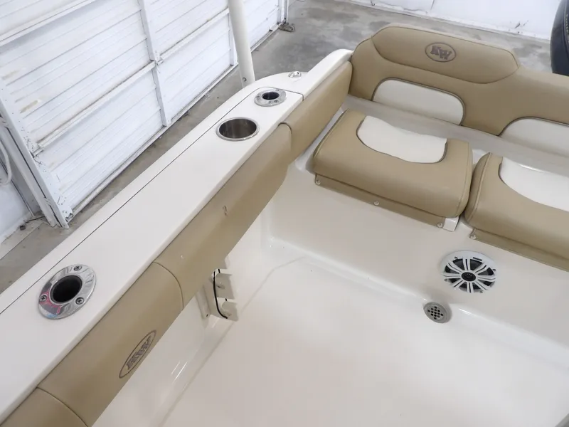 Slide: The Image of Interior of a 2016 Key West 219 FS boat with beige seating. - 34