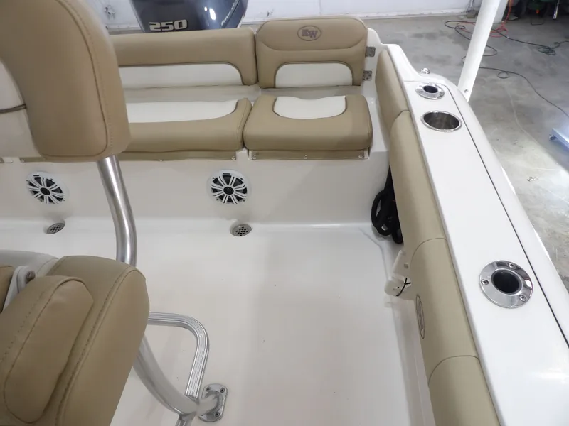 Slide: The Image of Interior of a 2016 Key West 219 FS boat with beige seating. - 35
