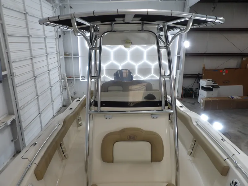 Slide: The Image of Interior view of a 2016 Key West 219 FS boat in a garage. - 6