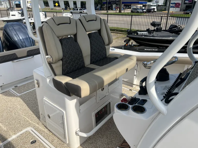 Slide: The Image of Interior of 2021 Tidewater 292 CC Adventure boat with comfortable seating. - 29