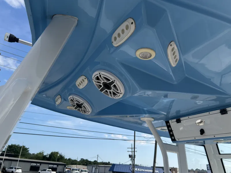 Slide: The Image of Interior view of 2021 Tidewater 292 CC Adventure boat with speakers. - 46