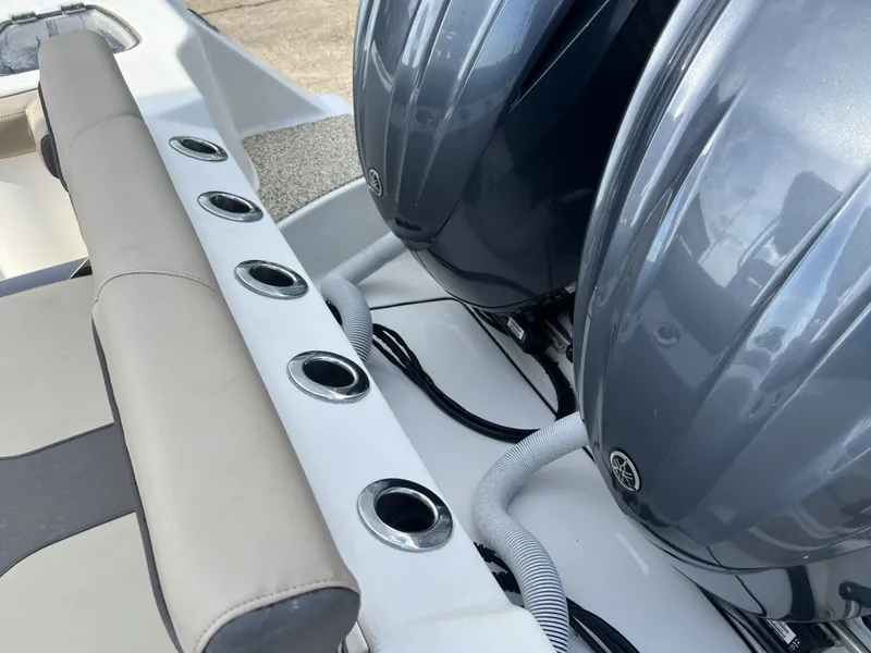 Slide: The Image of Tidewater 292 CC Adventure 2021 with Yamaha engines and fishing rod holders. - 49