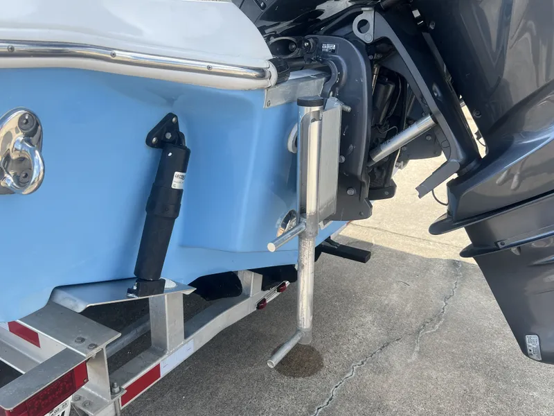 Slide: The Image of Tidewater 292 CC Adventure 2021 boat hull and motor view. - 11