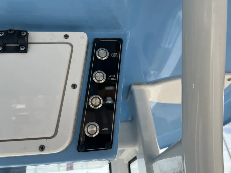 Slide: The Image of Control panel on a 2021 Tidewater 292 CC Adventure boat. - 33