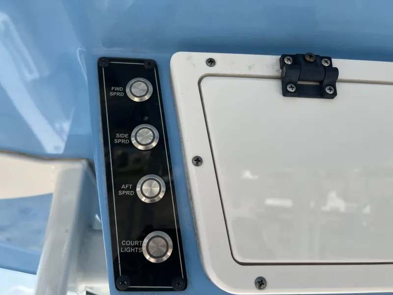 Slide: The Image of Switch panel on a 2021 Tidewater 292 CC Adventure boat. - 34
