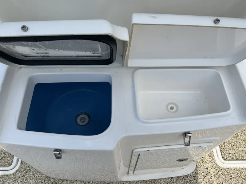 Slide: The Image of Tidewater 292 CC Adventure 2021, dual sink area on a boat. - 44