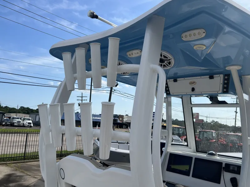 Slide: The Image of 2021 Tidewater 292 CC Adventure with rod holders and electronics. - 45