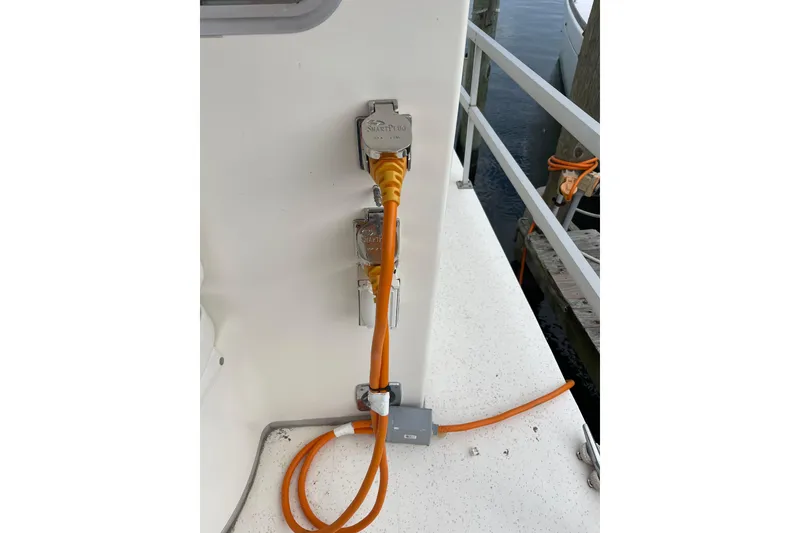 Slide: The Image of Power connection on a 1991 Gibson 37 Standard Houseboat with orange cable. - 29