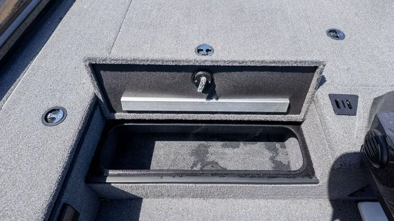 Slide: The Image of 2023 Ranger RT178 boat with open storage compartment. - 12