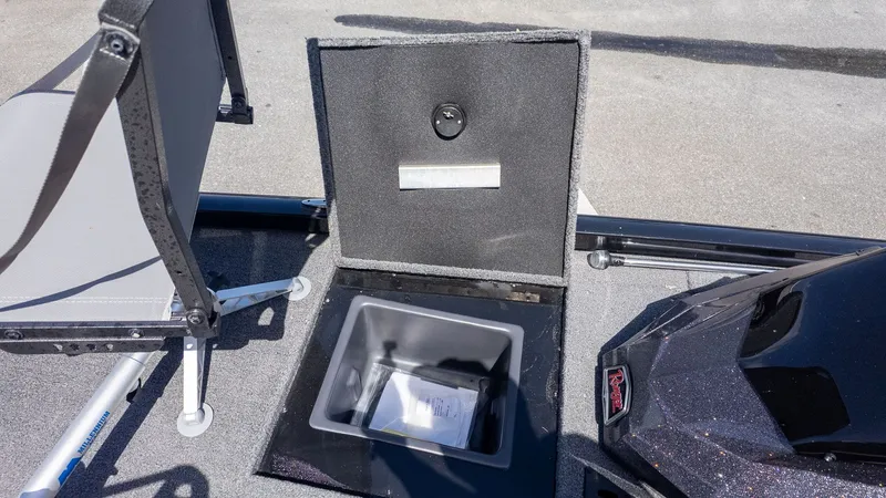 Slide: The Image of 2023 Ranger RT178 boat with open storage compartment and seat. - 14