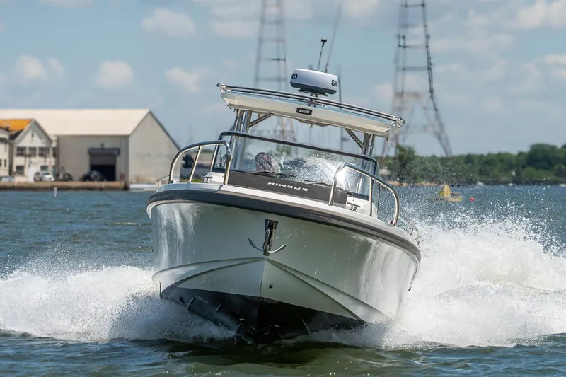 Slide: The Image of Nimbus Tender 9 boat 2023 cruising on water at full speed. - 1