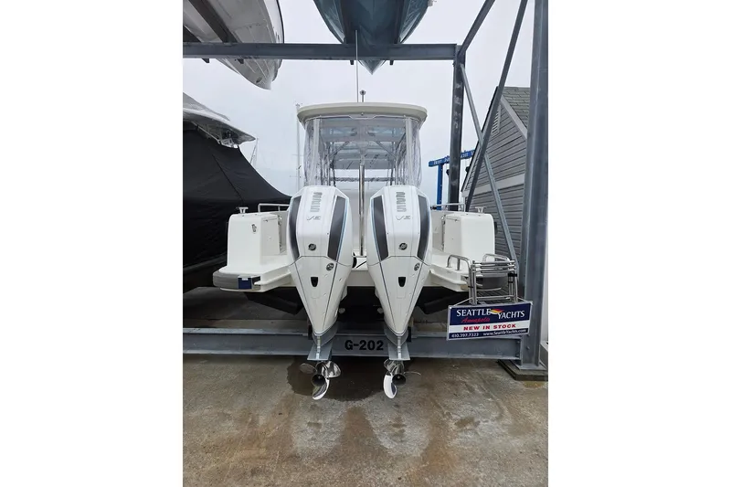 Slide: The Image of 2023 Nimbus T9 boat with dual outboard engines at Seattle Yachts dealership. - 30