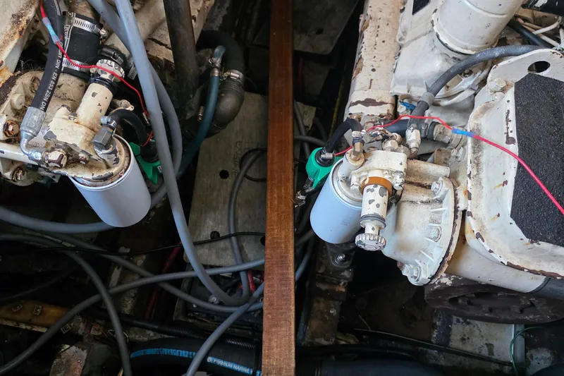 Slide: The Image of Engine room of a 1991 Marine Trader Trawler with visible mechanical components. - 38