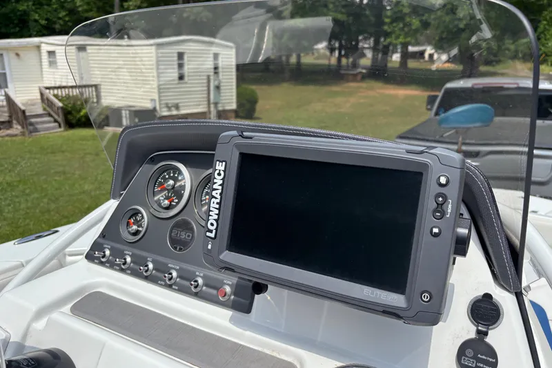 Slide: The Image of Dashboard of a 2020 Tahoe 2150 CC boat with Lowrance Elite display. - 23