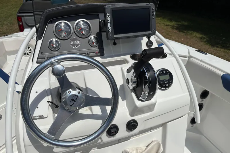 Slide: The Image of Steering console of 2020 Tahoe 2150 CC boat with gauges and navigation system. - 9