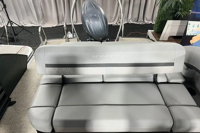 Slide: The Image of 2026 Bennington 22 M Swingback boat interior with sleek gray seating and modern design. - 6