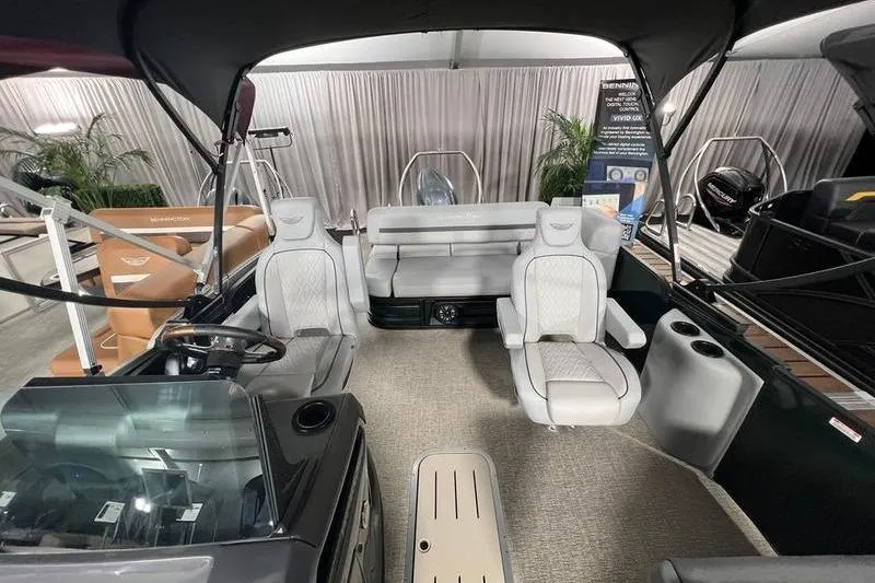 Slide: The Image of Interior of 2026 Bennington 22 M Swingback pontoon boat with luxurious seating and modern design. - 7