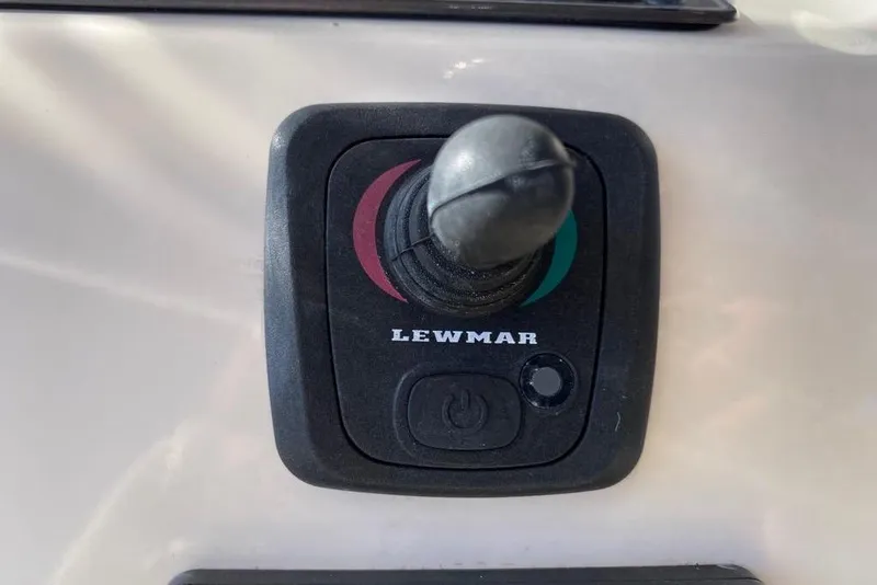 Slide: The Image of Lewmar joystick control on 2016 Grady-White Canyon 336 boat dashboard. - 31