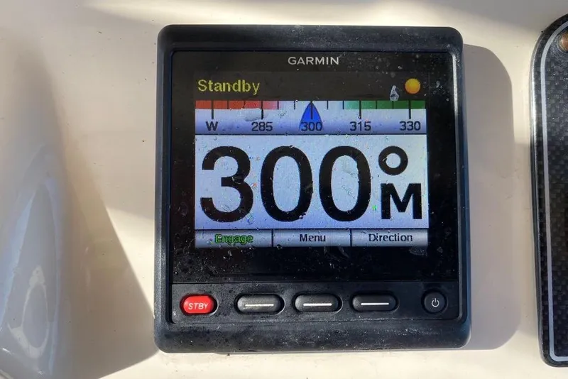 Slide: The Image of Garmin marine display showing 300° heading on a 2016 Grady-White Canyon 336 boat. - 40