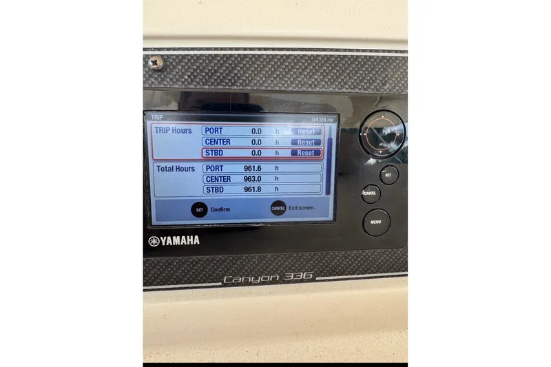 Slide: The Image of Yamaha display on 2016 Grady-White Canyon 336 showing engine hours and settings. - 41