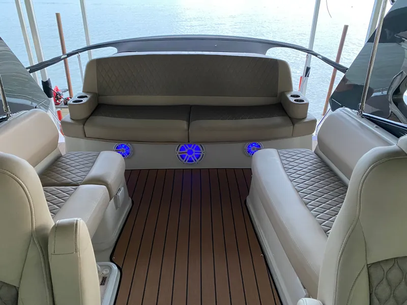 Slide: The Image of Interior of 2012 Carver 36 Mariner with luxurious seating. - 13
