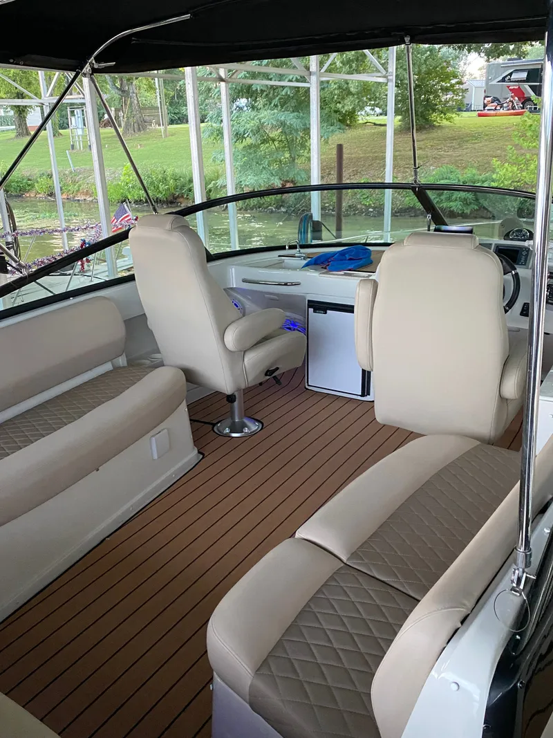 Slide: The Image of Interior of 2012 Carver 36 Mariner with elegant seating. - 16