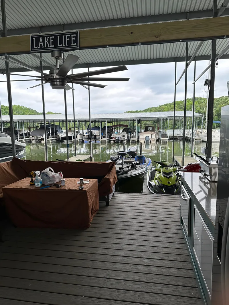 Slide: The Image of Boat dock with Carver 36 Mariner 2012 and lake view. - 20