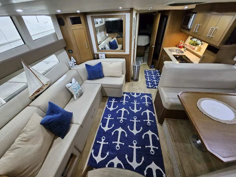 Slide: The Image of Interior of 2012 Carver 36 Mariner with nautical decor. - 30