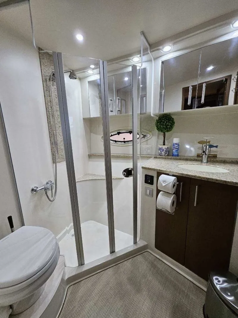 Slide: The Image of Luxurious bathroom in a 2012 Carver 36 Mariner yacht. - 32