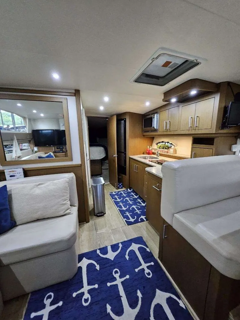 Slide: The Image of Interior of 2012 Carver 36 Mariner with nautical decor. - 34