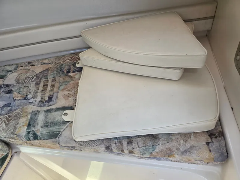 Slide: The Image of Interior of a 2002 Grady-White Seafarer 226 boat with cushions. - 24