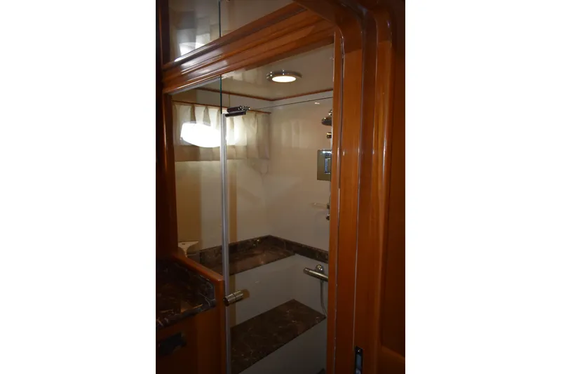 Slide: The Image of Luxurious bathroom interior on 2004 Ocean Alexander 64 Pilothouse yacht. - 60
