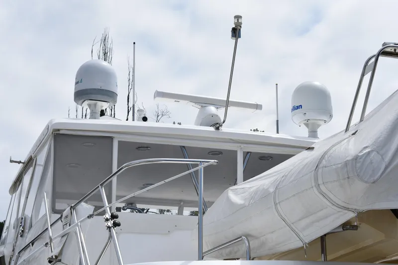 Slide: The Image of 2004 Ocean Alexander 64 Pilothouse yacht with radar and satellite equipment on deck. - 31