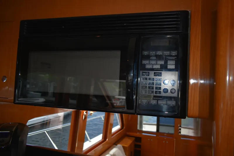 Slide: The Image of Microwave in 2004 Ocean Alexander 64 Pilothouse yacht kitchen interior. - 44