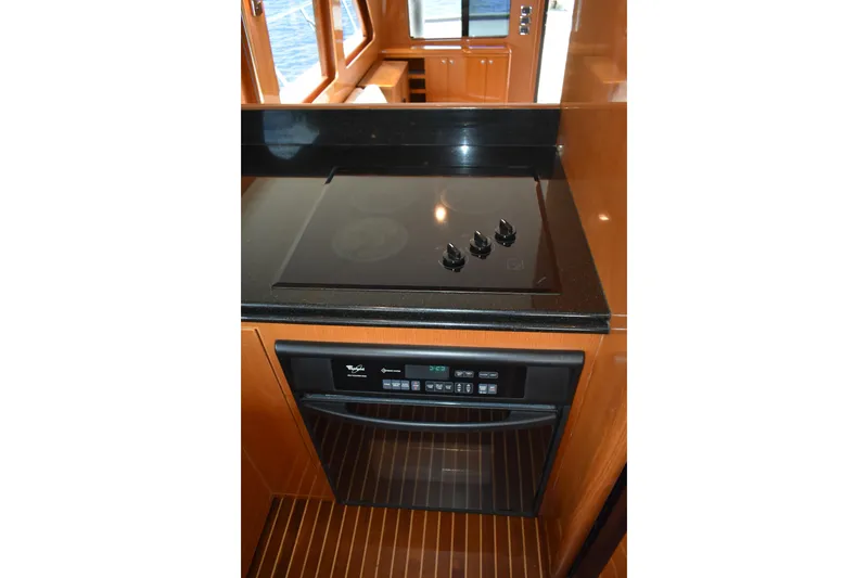 Slide: The Image of Modern kitchen area in 2004 Ocean Alexander 64 Pilothouse yacht. - 43