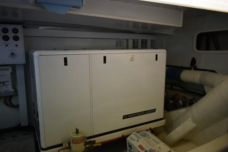 Slide: The Image of Engine room of 2004 Ocean Alexander 64 Pilothouse with Northern Lights generator. - 74