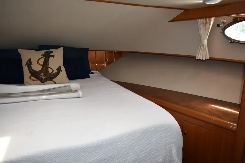 Slide: The Image of Luxurious cabin interior of 2004 Ocean Alexander 64 Pilothouse yacht with nautical decor. - 70