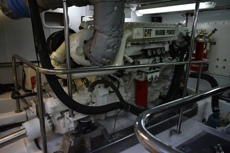 Slide: The Image of Engine room of 2004 Ocean Alexander 64 Pilothouse with CAT Marine Power engine. - 78