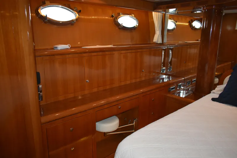 Slide: The Image of Luxurious wooden interior of 2004 Ocean Alexander 64 Pilothouse yacht cabin. - 53