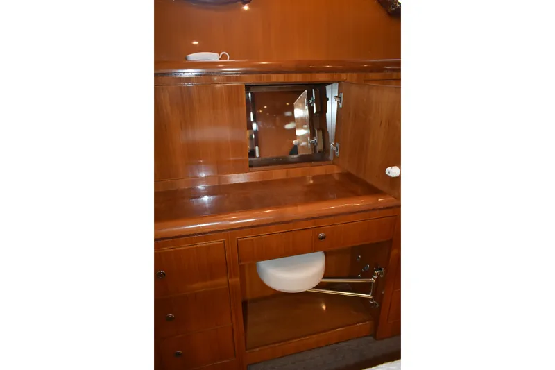 Slide: The Image of Luxurious wooden cabinetry in 2004 Ocean Alexander 64 Pilothouse yacht interior. - 54