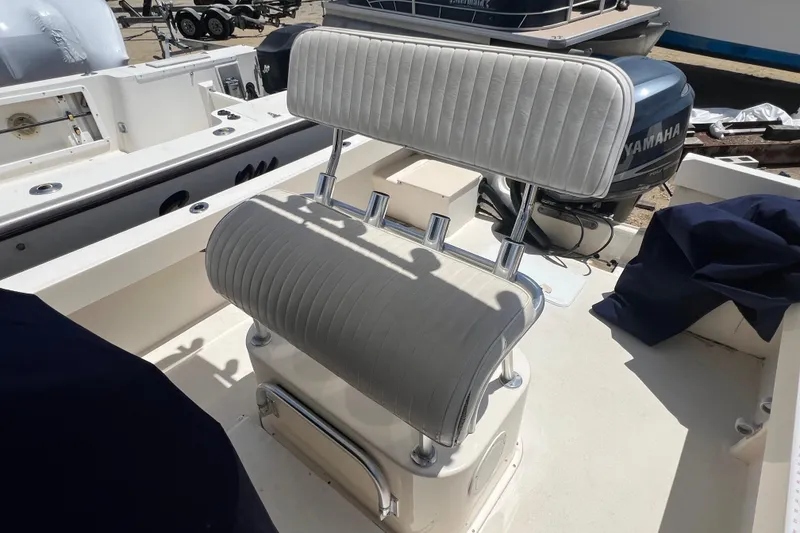 Slide: The Image of 2004 Parker 2300 Special Edition boat seat with Yamaha engine in background. - 11