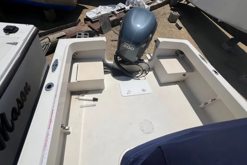 Slide: The Image of 2004 Parker 2300 Special Edition boat interior with Yamaha 200 engine. - 5