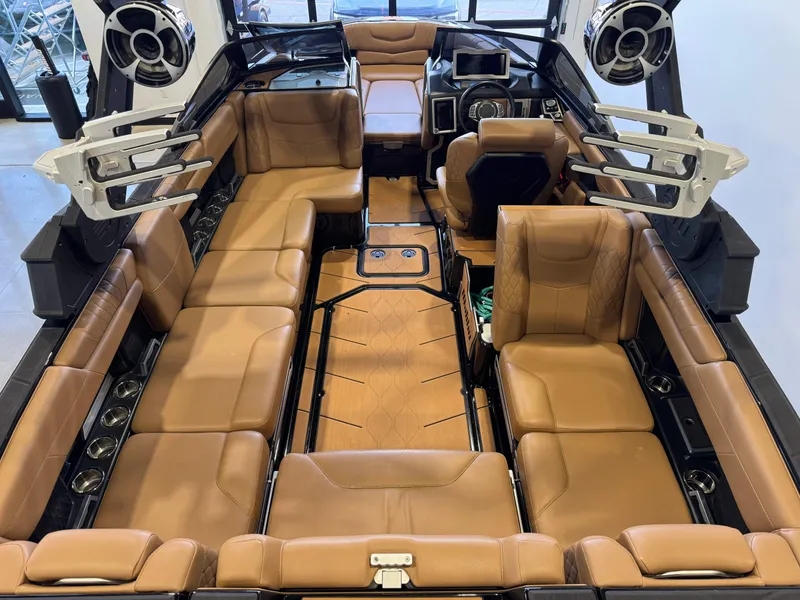 Slide: The Image of Interior of a 2021 Malibu M240 boat with luxurious leather seating. - 12