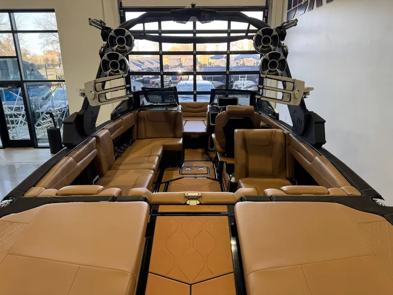 Slide: The Image of Interior of a 2021 Malibu M240 boat with luxurious leather seating. - 8