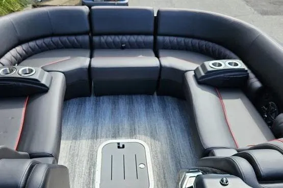 Slide: The Image of Luxurious seating area on 2026 Bennington 23 RFB boat with cup holders and sleek design. - 5