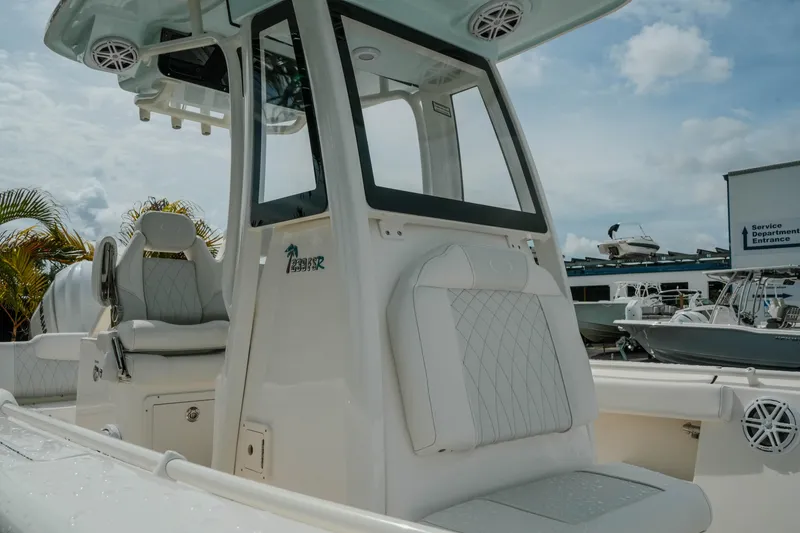 Slide: The Image of 2026 Key West 239 FSR boat with sleek design and comfortable seating. - 9