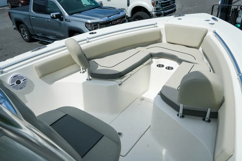 Slide: The Image of Interior of 2026 Key West 239 FS boat with cushioned seating and cup holders. - 26