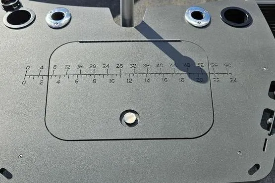 Slide: The Image of Bennington 22 SF 2026 boat deck with integrated measuring ruler and cup holders. - 15