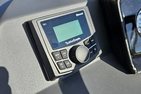 Slide: The Image of Rockford Fosgate audio system on 2026 Bennington 22 SF boat dashboard. - 19