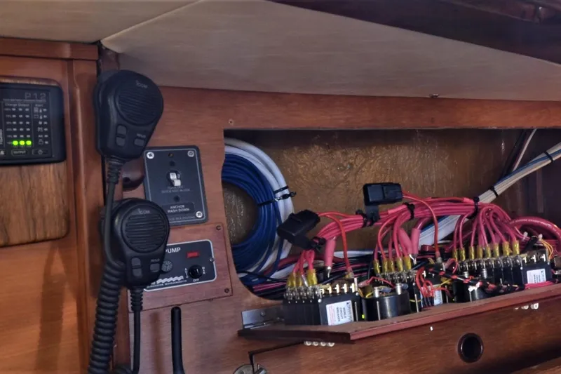 Slide: The Image of Electrical panel and wiring inside a 1984 Ohlson 38 sailboat. - 19